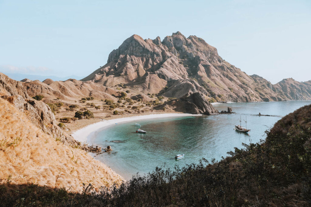 mount padar island coast view with boats near komodo indonesia